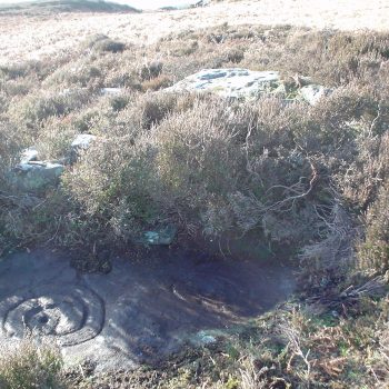 Cup and ring marked stone. © Copyright ARS Ltd 2018