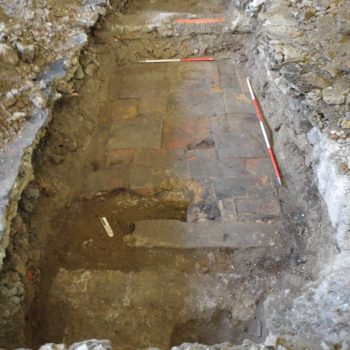 Well-preserved stone floor of the mill (scales = 2m + 1m).