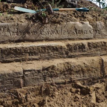 An inscription on the wall of the dam which reads ' Sir Ambrose Crowley Anno 1674'. © Copyright Archaeo-Environment