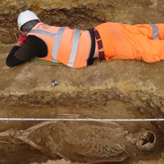 One of our team members recording the skeletons.