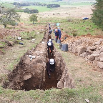 ARS Ltd staff and volunteers excavating within the trench spanning the terrace staircase.