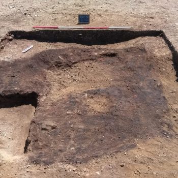 A large pit which was filled with organic material including charred twigs from oak and ash trees.