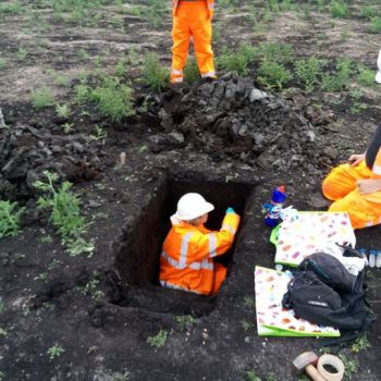 Professor Inger Alsos from the University of Tromsø Museum taking ancient DNA samples from the peat infill of wetland 1.