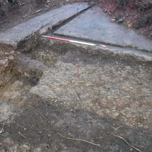 The concrete base of the Nissen hut (scale = 1m). © Copyright ARS Ltd 2020