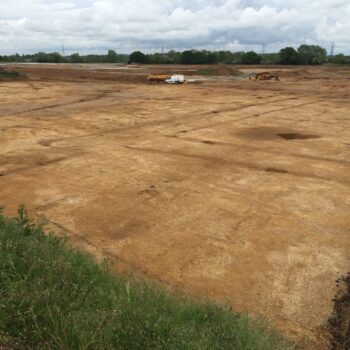 View looking east across part of the Roman field system and the Viking enclosure © Copyright ARS Ltd 2022