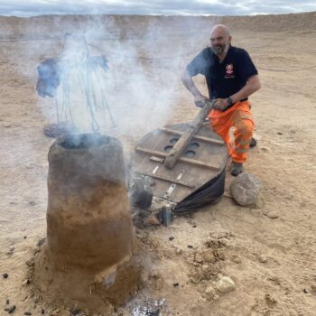 Bellows being used to blow air into the Iron Age furnace to increase the heat - Lochinver archaeology open day © Copyright ARS Ltd 2022