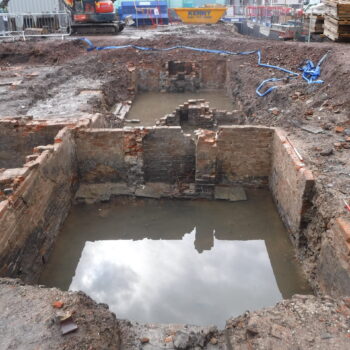 Overview of former back-to-back cellars with knocked through doorways and fireplaces at Hatter Street © Copyright ARS Ltd 2022