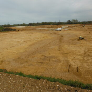 View looking east across part of the Roman field system and the Viking enclosure © Copyright ARS Ltd 2022