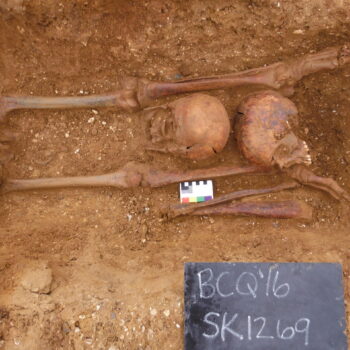 One Roman grave, two skulls, three legs OR Copper alloy side-looped and socketed spearhead © Copyright ARS Ltd 2022